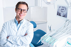 Odontologist Standing in His Sanitized and Disinfected Dental Office