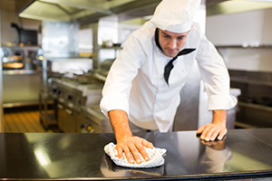 Cook Cleaning Kitchen