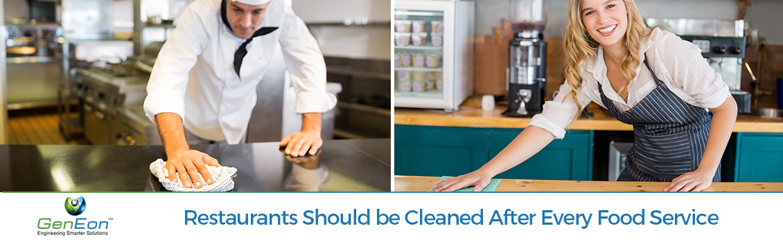 Cook and Waitress Cleaning Kitchen Counter