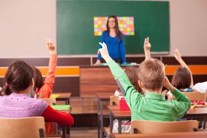 Many School Environments Contain Hazards that May Cause Illness and Increase Student Absenteeism Rates Kids Participating in Classroom
